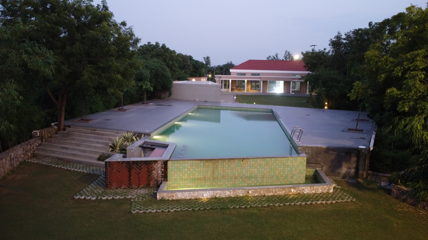SilverOak Club Infinity venue swimming garden area at twilight